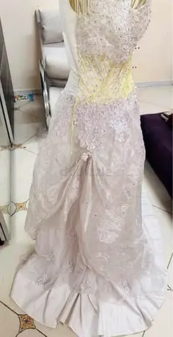 Wedding gown brand new used once size small 30 bust size cash on delivery can be done all over UAE