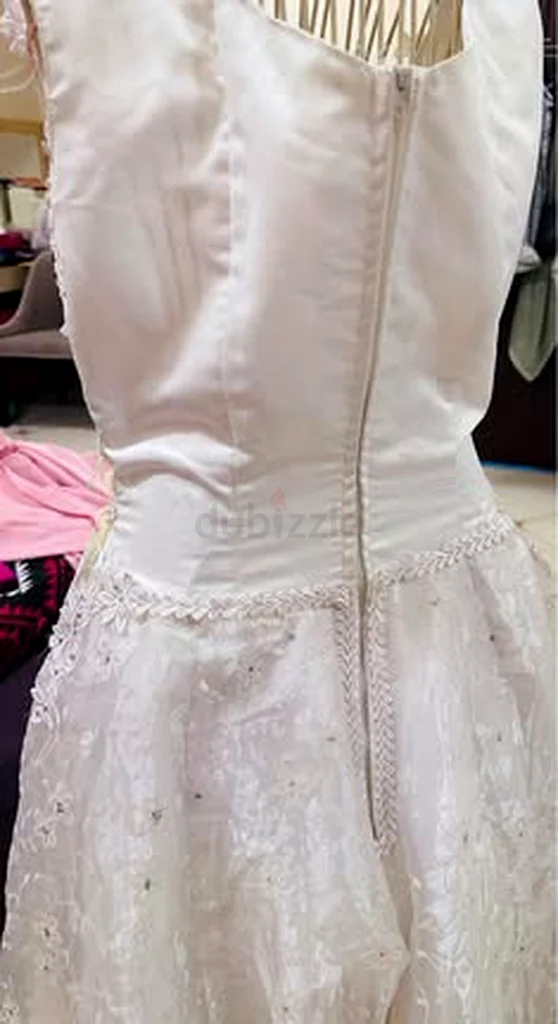 Wedding gown brand new used once size small 30 bust size cash on delivery can be done all over UAE63238583170433111