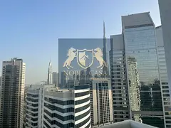 Fully Furnished Studio with Canal &amp; Partial Burj Khalifa View in Business Bay