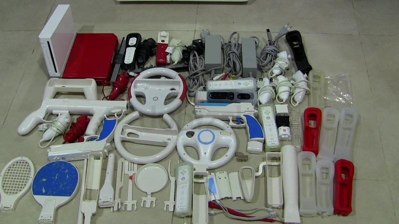 2 wii consoles   wii fit plus   motion plus controller63202194434435111
