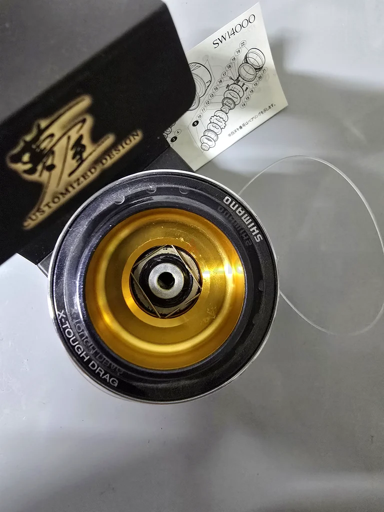 Shimano twin power 8000 size spool with 60lb line63242691926274112