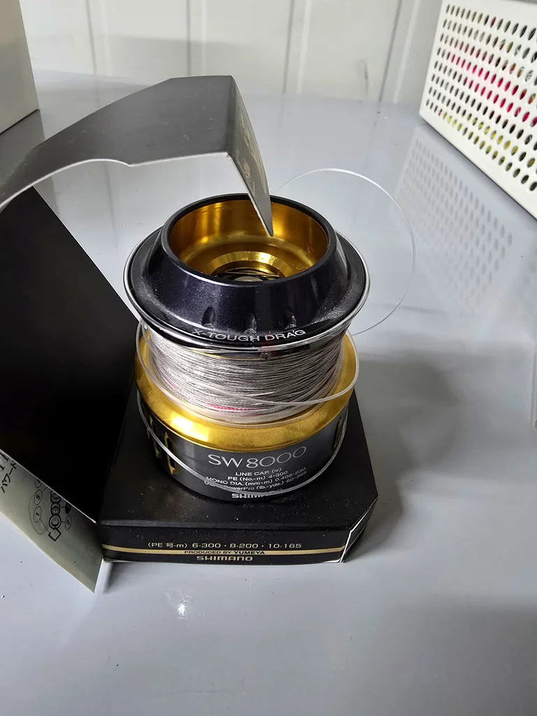 Shimano twin power 8000 size spool with 60lb line63242691926274111
