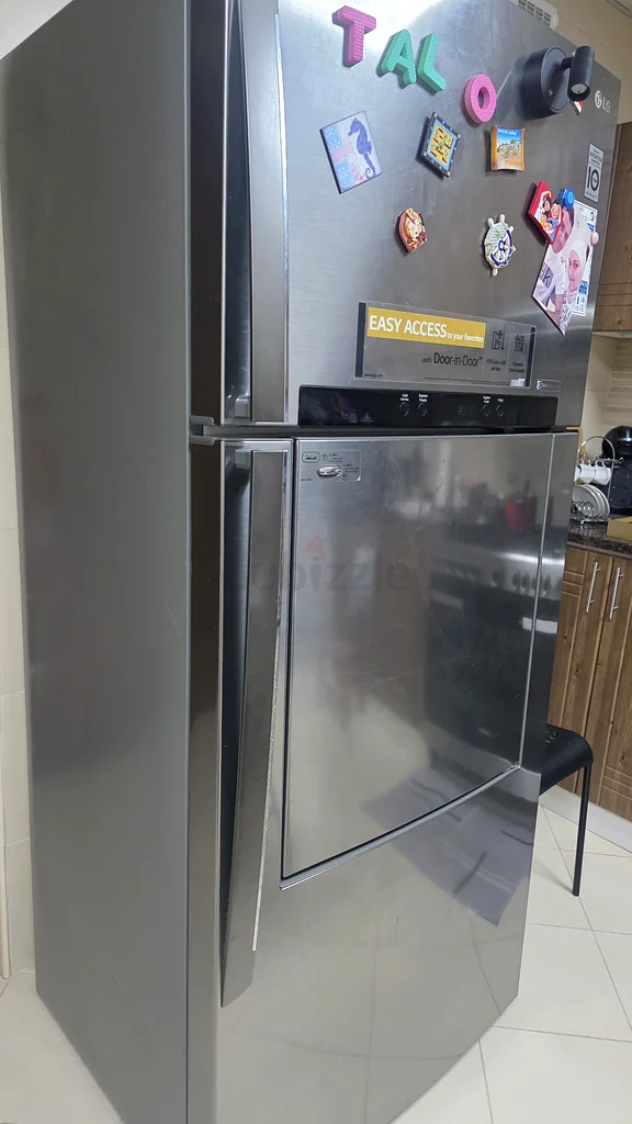 ثلاجة ذكية عصرية وفعالة بمحول كهربائي63253485100931111