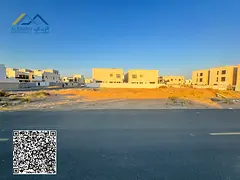 Land in Al Zahya, two corners, behind the services, free ownership, nationalities