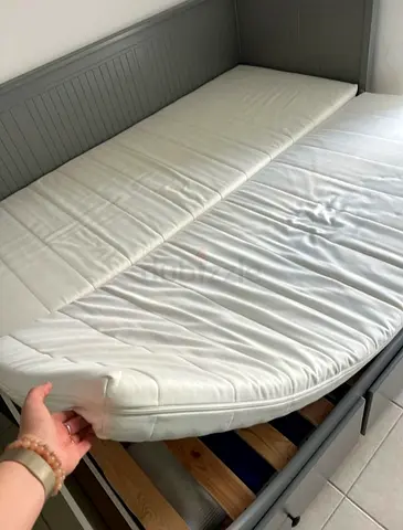 Ikea hamness day bed frame with 3 storage drawers underneath and with 2 Ikea mattresses