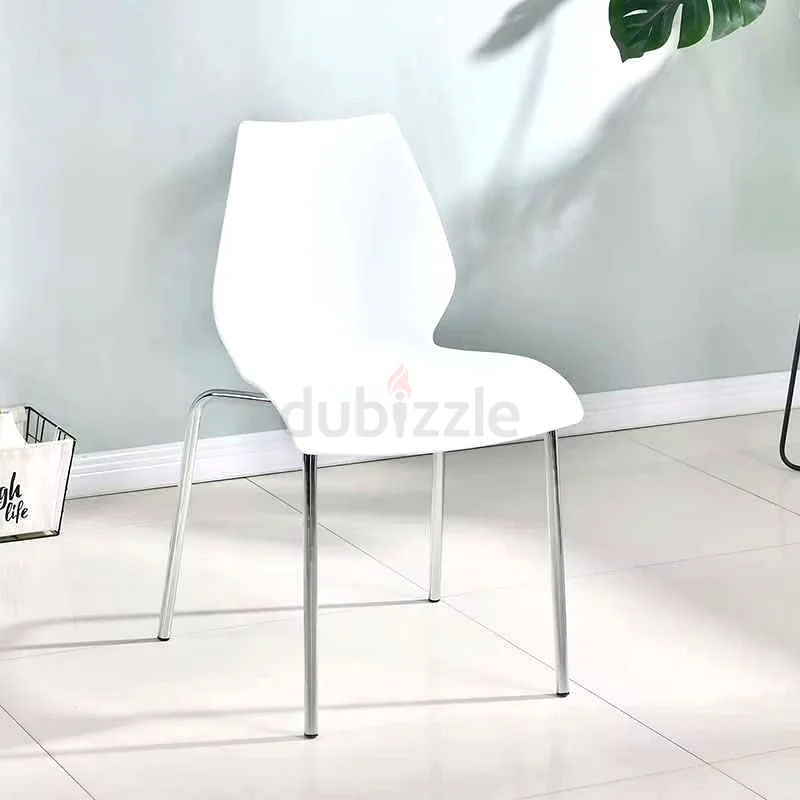 طاولة طعام عصرية من الزجاج وكراسي أنيقة63216829585282111