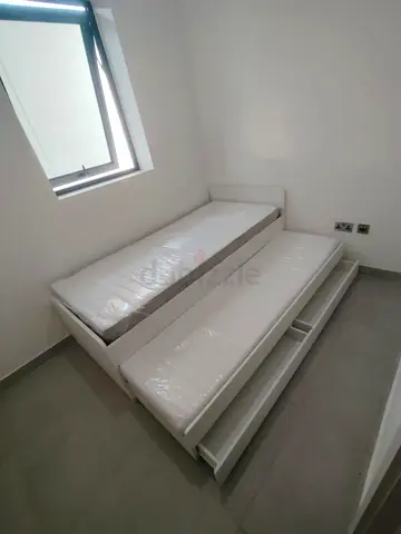 IKEA slakt bed frame with under bed 2 storage drawers underneath and with 2 IKEA mattresses