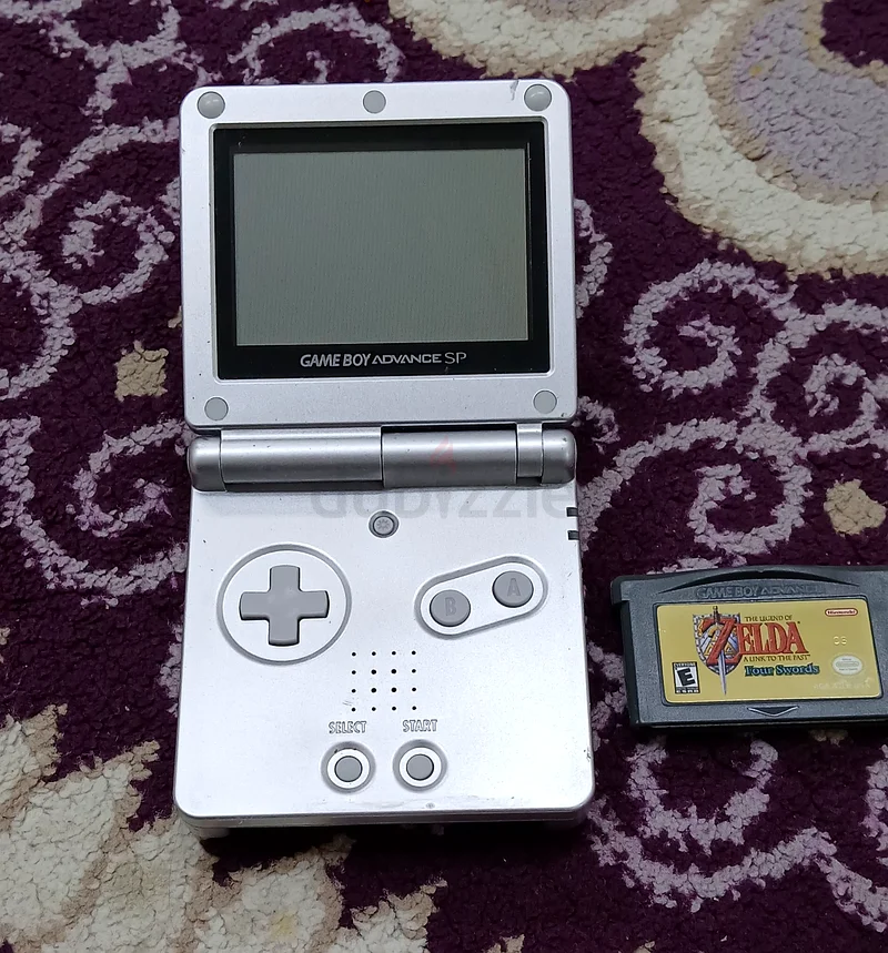 Nintendo Game Boy in good condition with the game Legend of Zelda: A Link to the Past/Four Swords63230710099969119