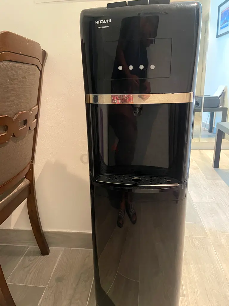 Water dispenser bottom loading