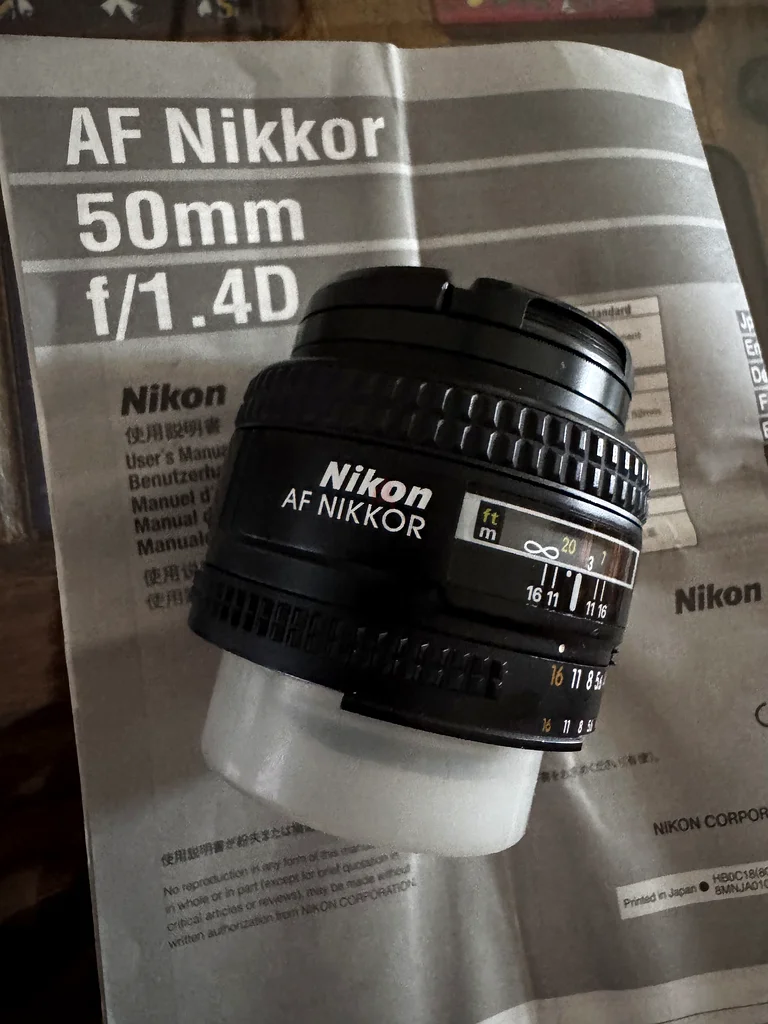 عدسة نيكور 50 مم f/1.4D63234134156289113