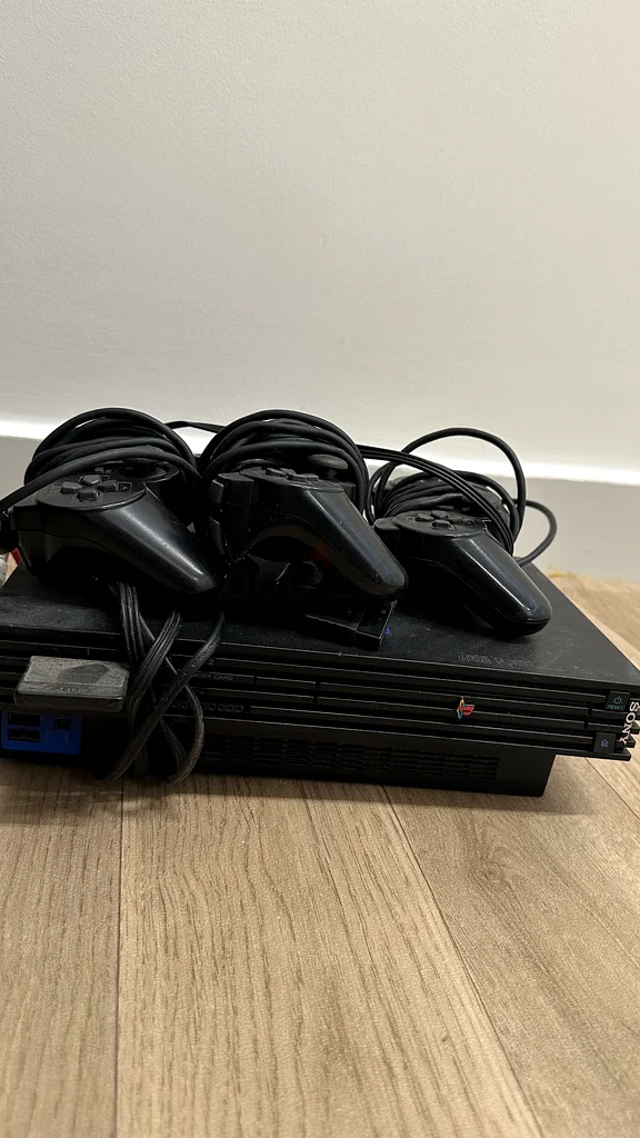 Classic Sony PlayStation 2 Console with Controllers - Rediscover Your Retro Gaming!632660813173771114