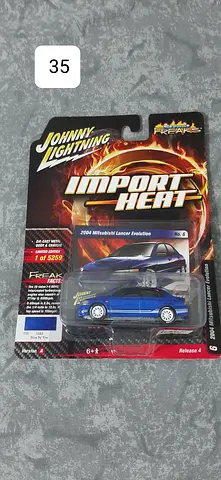 Johnny Lightning 2004 Mitsubishi Lancer Evolution - Rare Collectible Diecast