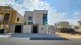 Villa for sale in Ajman, prime location - very excellent finishes - large building area, freehold