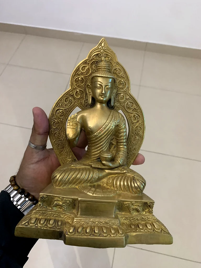 Brass Buddha idol63225745253890112