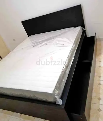 IKEA malam king size 180/200bed with IKEA mattress and 2 storage drawers underneath .