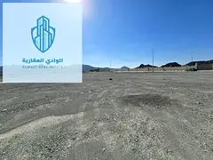 land for sale masfout area.