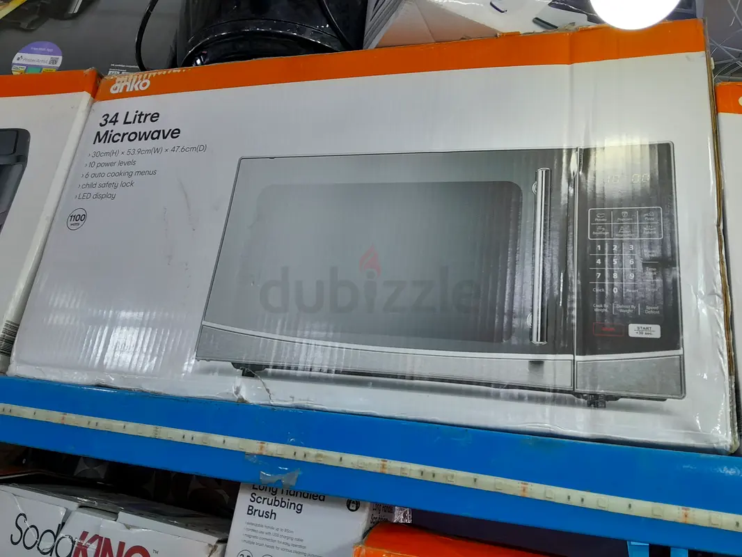Brand New 34 Litre Microwave Oven - Perfect for Your Kitchen!