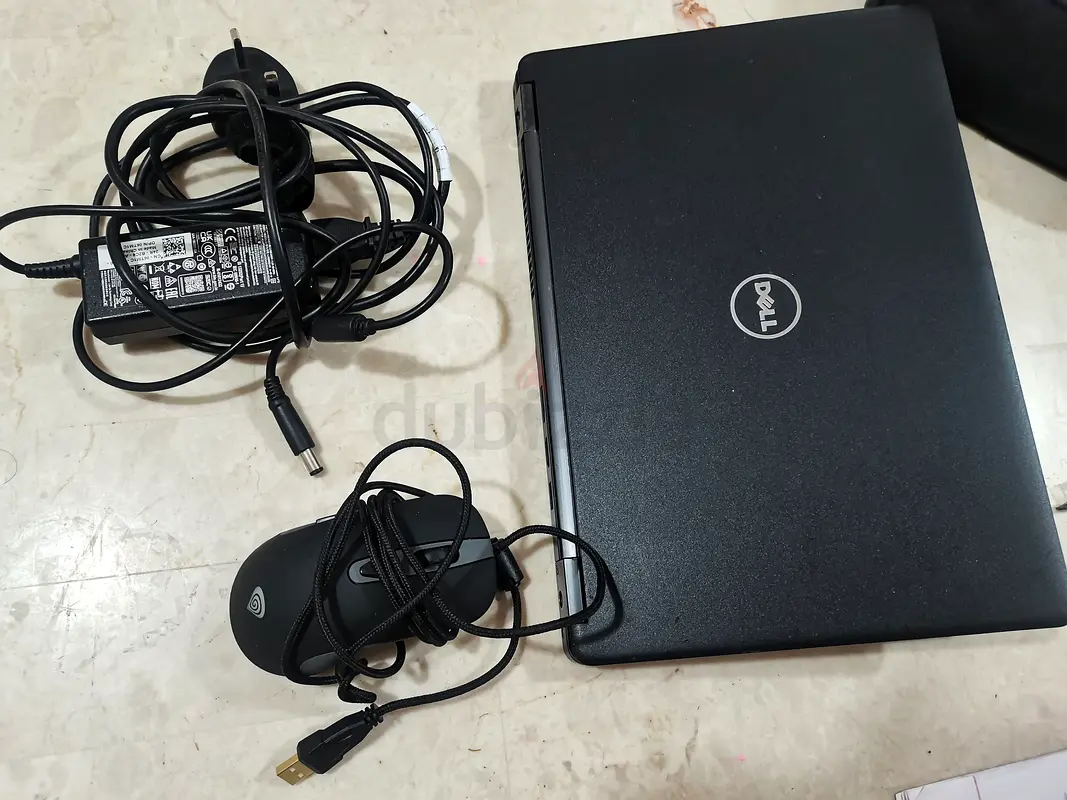 Dell Laptop with Mouse and Charger - Great Condition!