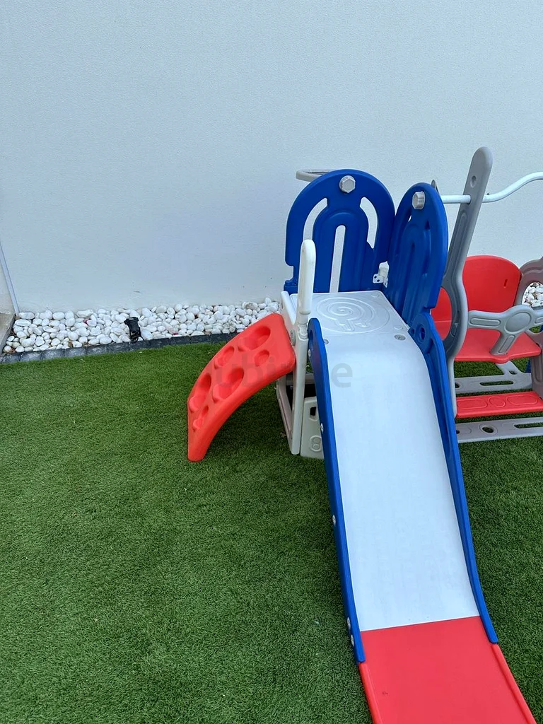 Kids slide and swing63195109447298112