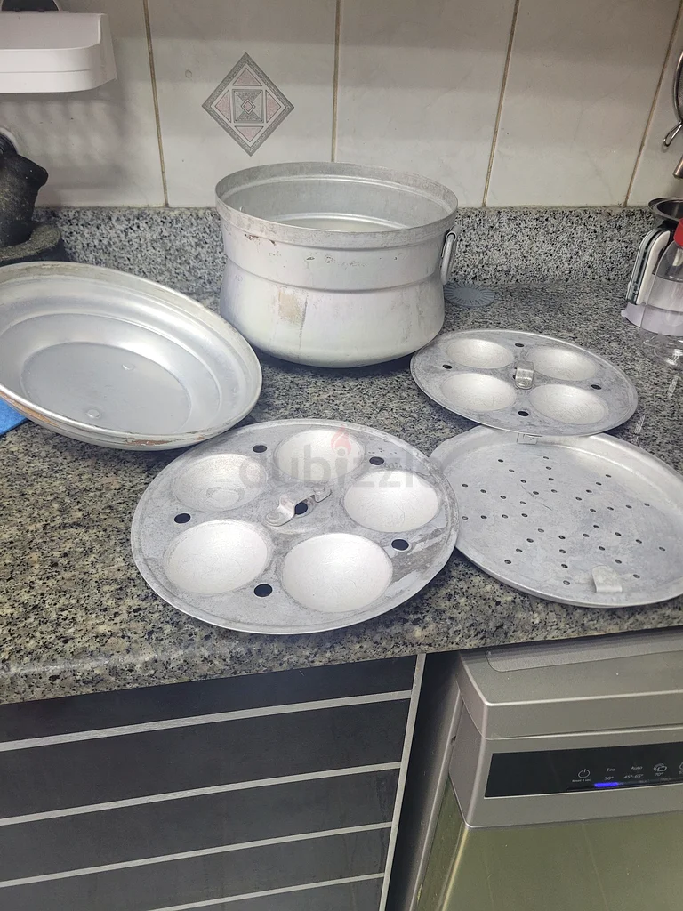 بائعو صانع الإدلي / القدر المبخر!63255004273026112