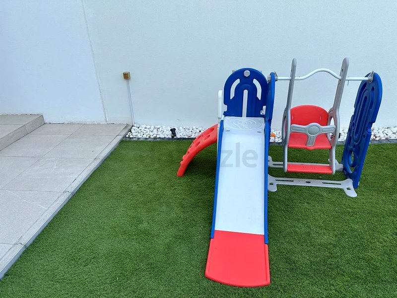 Kids slide and swing63195109447298111