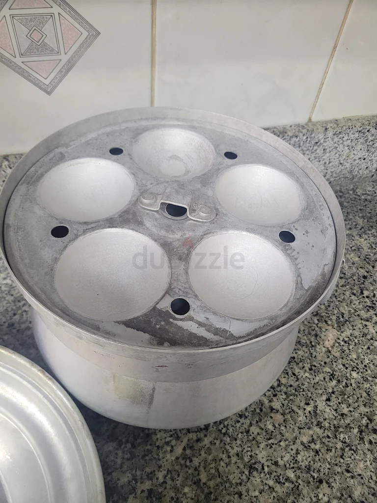 بائعو صانع الإدلي / القدر المبخر!63255004273026111