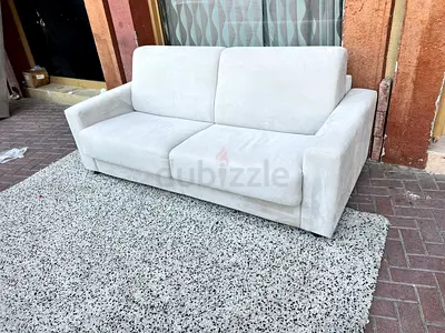 Italian branded two seater sofa bed Beige