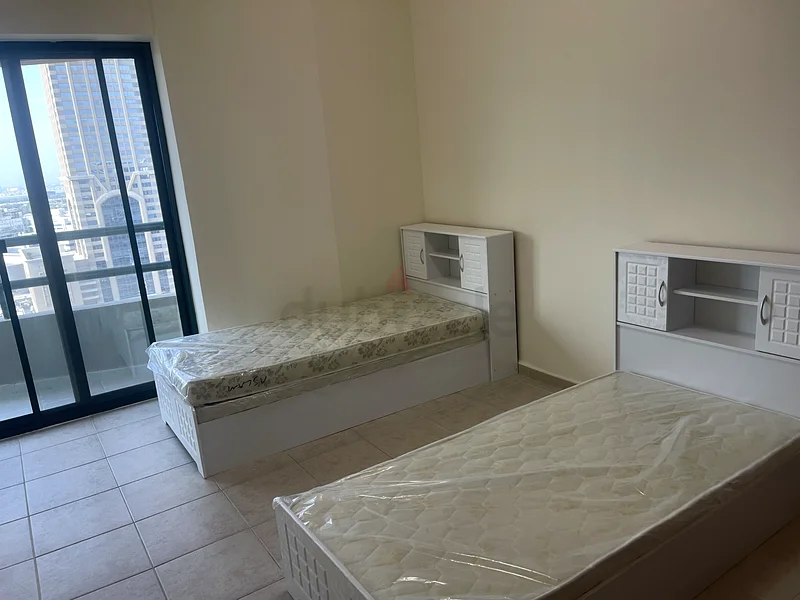 “All-Inclusive 3-Person Room with Sheikh Zayed Road Views – Live Near the Metro!”63797914057987110