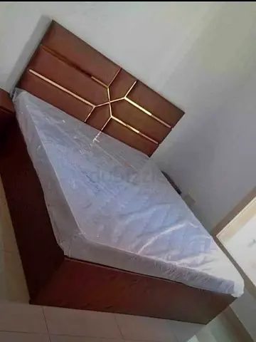 Stylish Wooden Bed with Modern Headboard