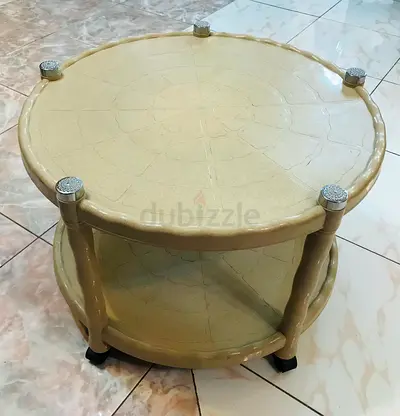 Round plastic coffee or garden table with wheels