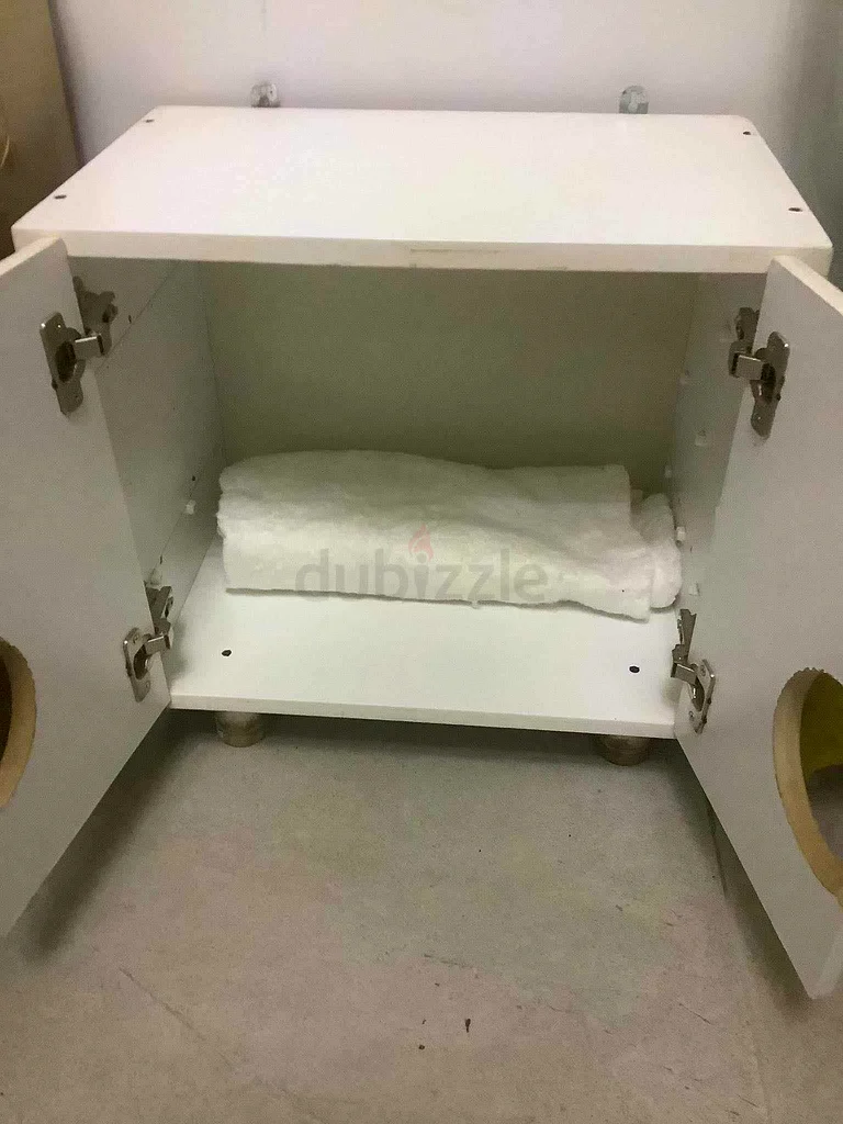 A white wooden cat house63232649441666111