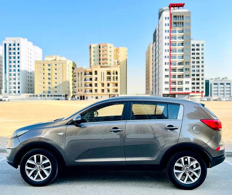 A Very Clean And Beautiful KIA SPORTAGE 2015 GREY GCC WITH CRUISE CONTROL REF. 735263172198716545111