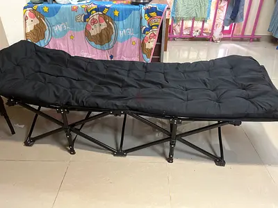 Versatile Foldable Camping Bed with Comfort Mattress.