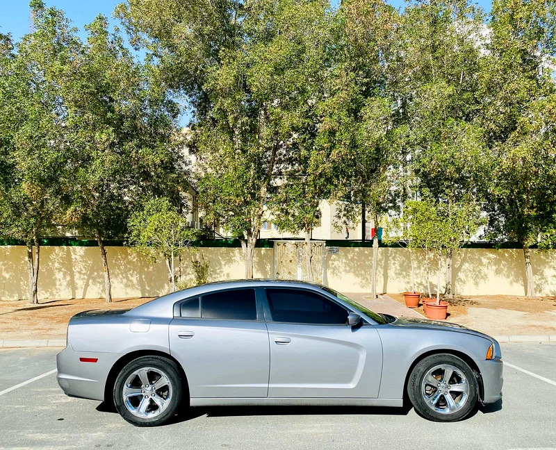 A Very Clean And Beautiful DODGE CHARGER SXT 2014 SILVER GCC WITH SUNROOF REF. 796563153704751361111