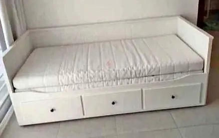 IKEA Hamnes Day bed with 3 storage drawers underneath and with 2 IKEA mattresses is available.