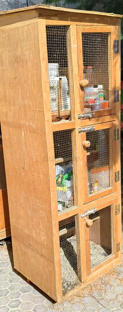 FOR SALE: 3-Portion Wooden Pigeon Cage with Wheels63231685840770113