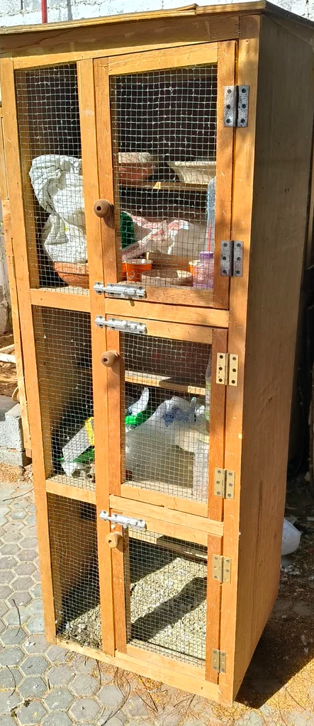 FOR SALE: 3-Portion Wooden Pigeon Cage with Wheels63231685840770114