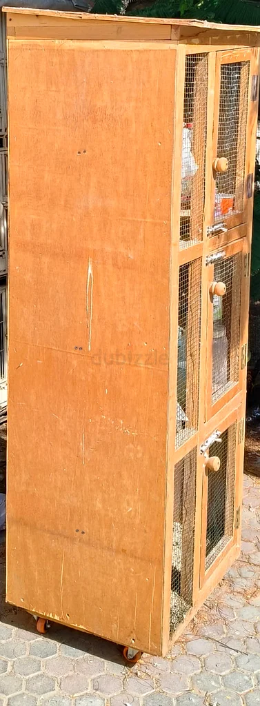 FOR SALE: 3-Portion Wooden Pigeon Cage with Wheels63231685840770111