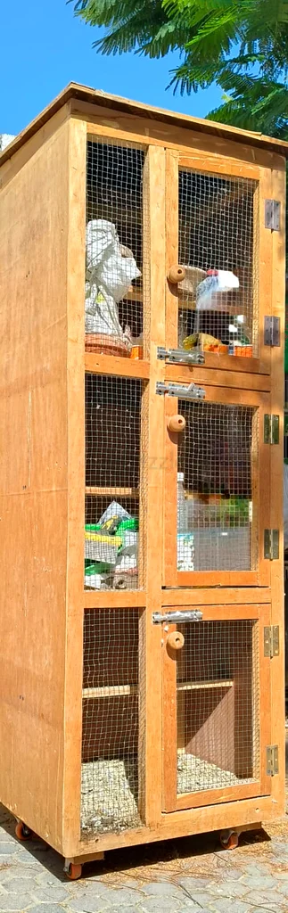 FOR SALE: 3-Portion Wooden Pigeon Cage with Wheels63231685840770112