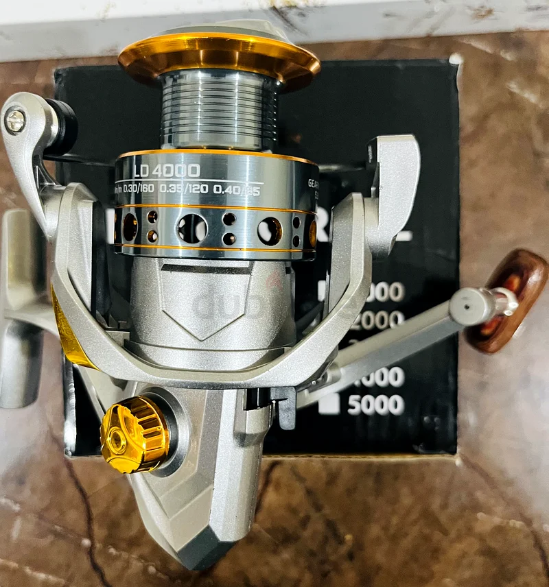Charming silver fishing reel , all metalic63241658756098111