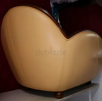 Elegant Beige Curved Armchair - A Statement Piece for Your Home