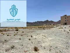 Land for sale in Masfout in a distinctive location