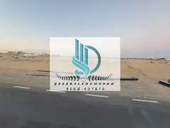 For sale in Sharjah: Corner plot of land in the Muzayra'a area, Al Rahmaniya suburb.