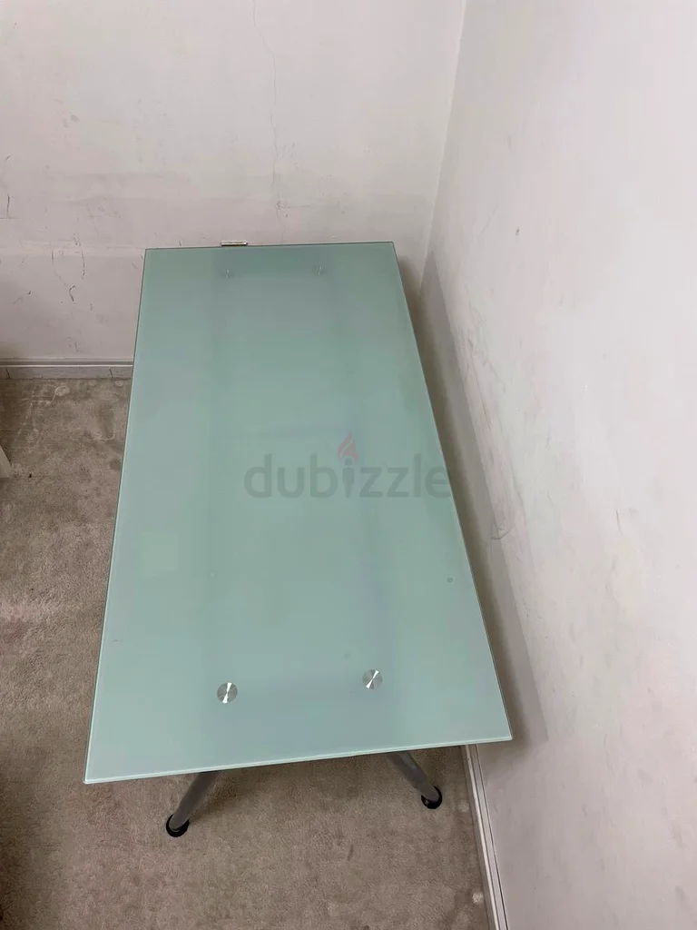 Sleek and Modern Glass Top Desk - Perfect for Any Workspace!63219342629889113