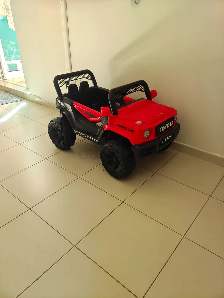 Toy Electric Ride-On Car for Kids - Red SUV! Original price 600 ..now selling in 50 aed only