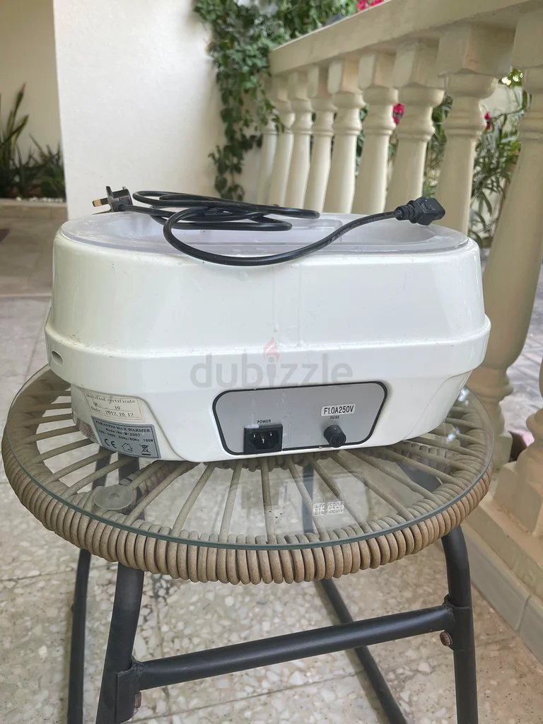 جهاز شمع البارافين63254498828802114