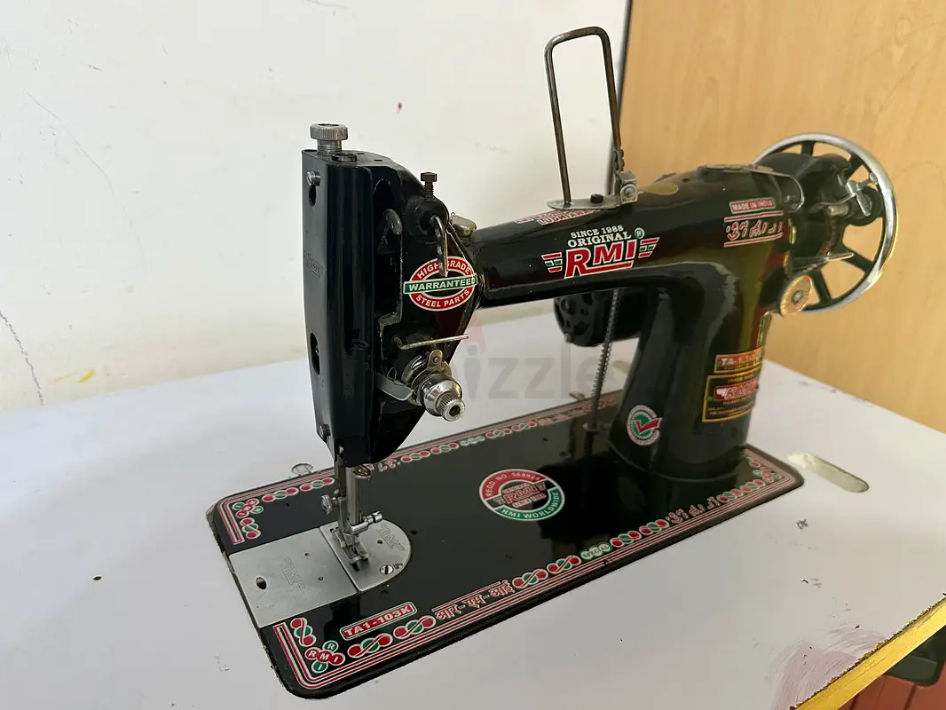 Sewing machine with table63253469075841112