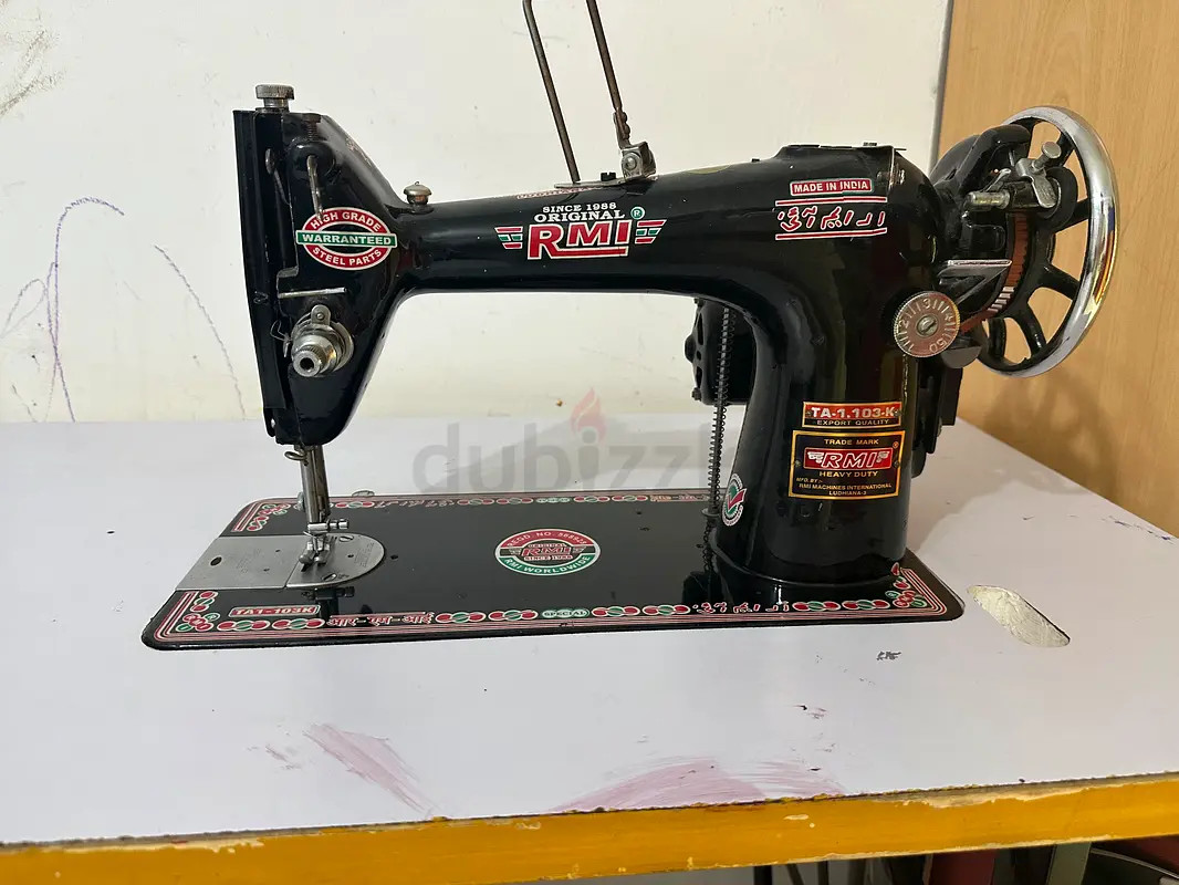 Sewing machine with table63253469075841113