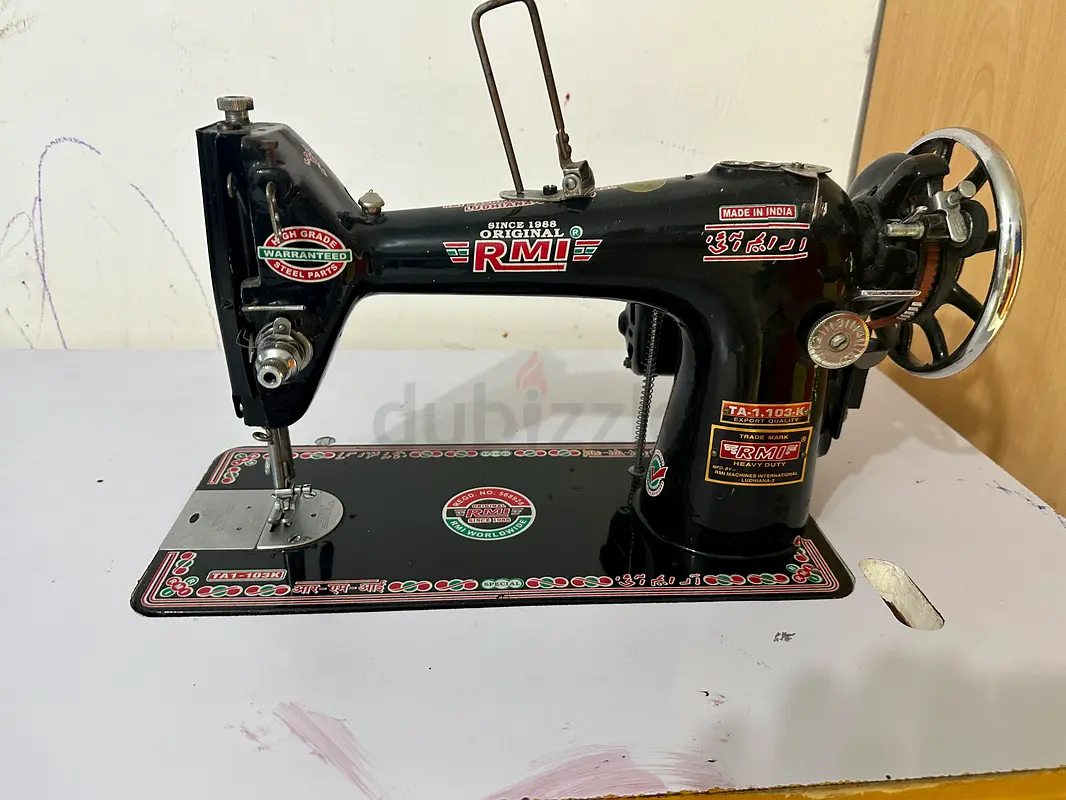 Sewing machine with table63253469075841111