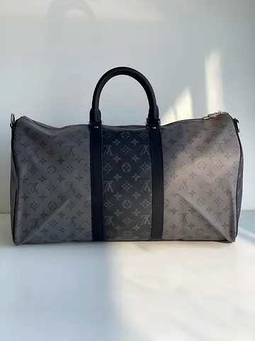 Luxury Louis Vuitton Duffel Bag - Travel in Style!